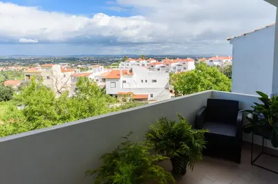 a view of a city from a building at Hillside Studio with Sea View & Fibre Internet in Albufeira