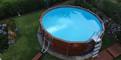 an overhead view of a large pool in a yard at Casa Albacor in Vilamoura