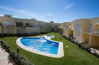 an aerial view of an apartment complex with a swimming pool at FLH Falésia Flat with Pool in Vilamoura