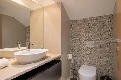 a bathroom with a sink and a toilet at VILLA SIBLING 2 in Vilamoura