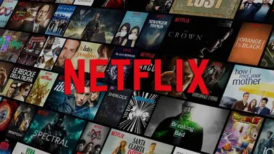 a bunch of books on a wall with the words netflix at AAA Apartments in Albufeira