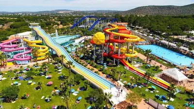 an aerial view of a water park with a roller coaster at Casa dos Teixeiras in Quarteira