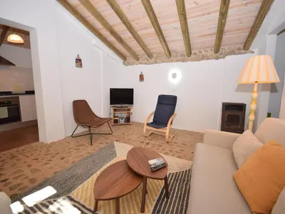 a table with two mugs on top of it at Delightful, authentic Quinta with pool in Loulé