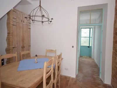 a flat screen tv hanging on a wall at Delightful, authentic Quinta with pool in Loulé