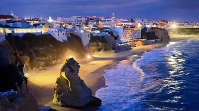 a view of a beach at night with buildings at Casa Katarina - Private Villa - Heated pool - Free Wifi - Air Con in Tunes