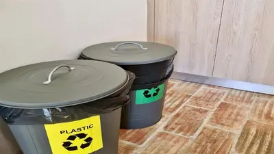 two trash cans sitting next to each other at Villa Azul - Clever Details, Luxury villa, private pool, access to a club with tennis court, playground, communal pools in Vilamoura