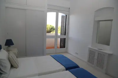 a white room with a bed and a window at Dreamly Sea in Albufeira