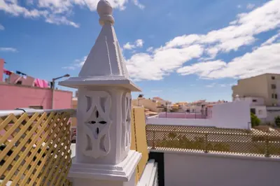 a white lantern sitting on top of a balcony at LovelyStay - Sweet Escape I - Terrace in Quarteira