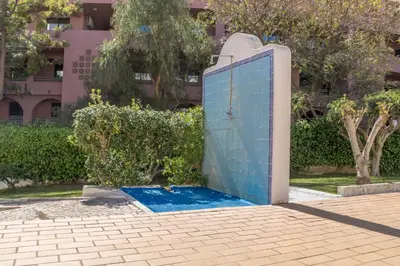 a blue door in front of a building at #005 Foxy B by Home Holidays in Albufeira