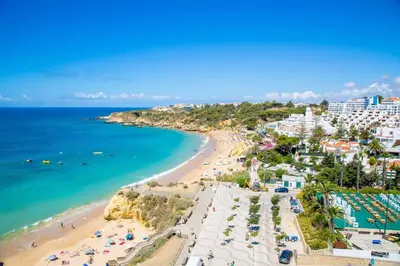 an aerial view of a beach and the ocean at Cozy apartment in Albufeira 76 m² with lovely terrace in Albufeira
