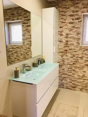 a bathroom with a sink and a mirror at Golf Mar Village By Vilamoura Sun- Vista Golfe in Vilamoura