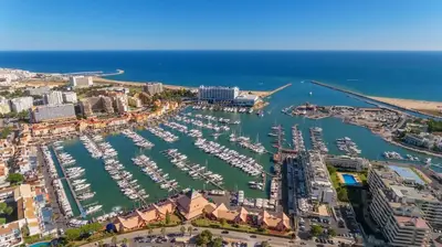 an aerial view of a harbor with boats at Walkable Marina Vilamoura Aquamar 513 VilamouraSun in Quarteira