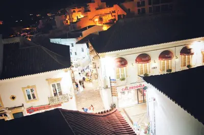 an overhead view of a city street at night at Peneco Albufeira GuestHouse in Albufeira