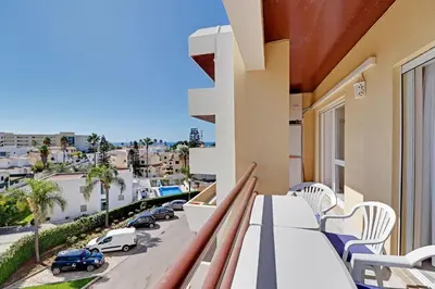 a balcony with a view of a parking lot at Albufeira Concept 1 with Pool by Homing in Guia