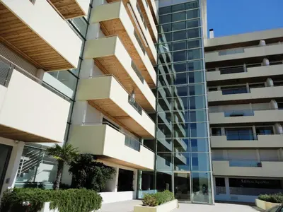 an external view of a building at Vilamoura Sun Aquamar 503 in Quarteira