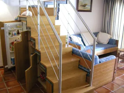 a set of stairs in a room with a play area at Welcoming House in Albufeira in Albufeira