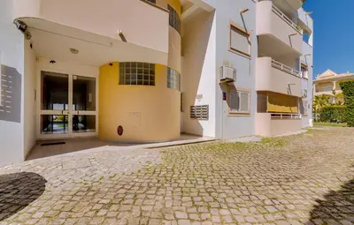 an external view of a building with a driveway at Falésia II - Nice Apartment - Vilamoura in Vilamoura