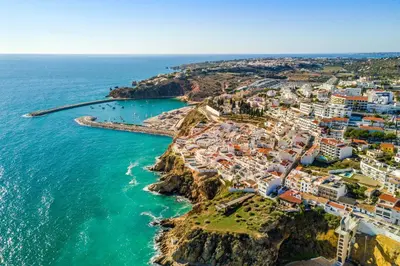 an aerial view of a town on the ocean at Townhouse N7 - Albufeira in Albufeira