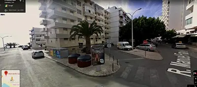 a rendering of a city street with a building at Quarteira Beach Holidays in Quarteira