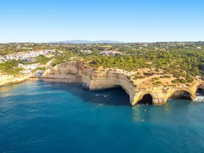 an aerial view of a beach with an arch in the water at Villa São Paulo by Algarve Vacation in Albufeira