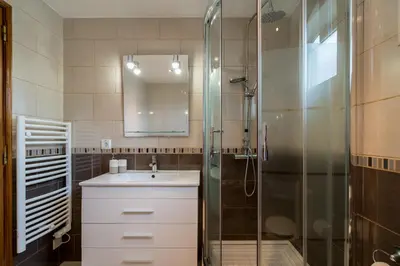 a bathroom with a sink and a shower at Casa Laranja Three bedroom Villa in Loulé
