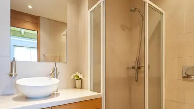 a bathroom with a sink and a shower at Emily in Vale do Lobo