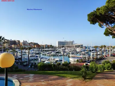 a marina with a bunch of boats in a harbor at Alsol C 5365-1 in Quarteira
