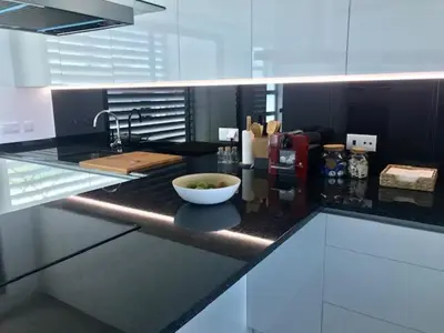 a kitchen with a bowl on a counter at Vila Meluna in Albufeira