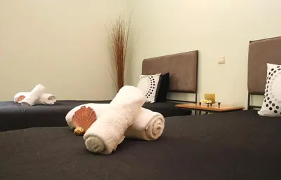 two beds with a stuffed animal on the bed at Villa Bogota by Algarve Vacation in Albufeira