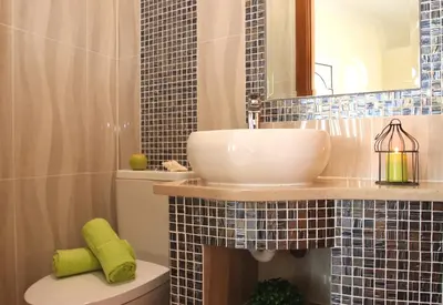 a bathroom with a sink and a mirror at Villa Moorea by Algarve Vacation in Guia