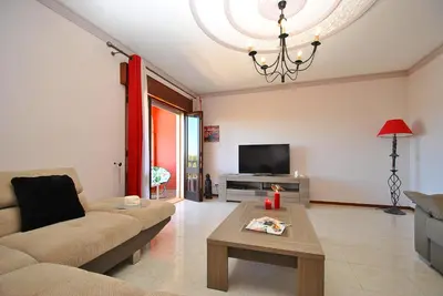 a living room with a couch and a table at Villa Zanzibar by Algarve Vacation in Olhos de Água