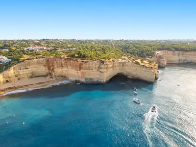 an aerial view of boats in the water under a bridge at Villa Melanésia by Algarve Vacation in Guia