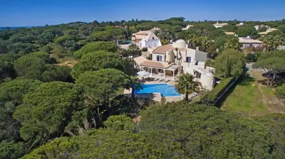 an aerial view of a house with a swimming pool at Villa Tulum by Algarve Vacation in Almancil