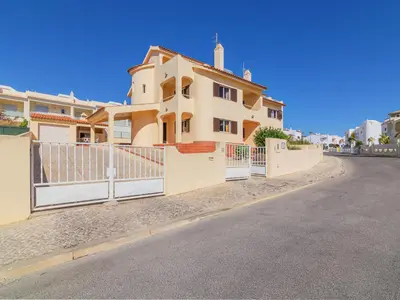 a house with a fence on the side of a street at Villa Flor de Maio by Interhome in Patroves
