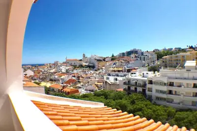 a view of a city from the balcony of a building at OLDTOWN great Terrasse & ROOFTOP in Albufeira