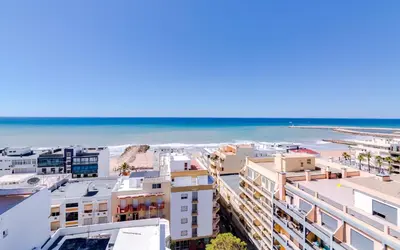 an aerial view of the beach and buildings at Sky - wonderful view to the beach - Quarteira in Quarteira