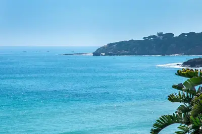 a view of the ocean from a beach at Beautiful Loule Villa Villa Quinta Tropical Private Pool Air Conditioning in Loulé