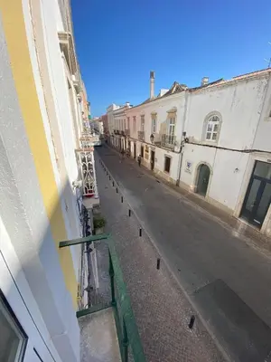 a view of a street from a balcony of a building at Faro Downtown Ria Formosa Studios in Faro