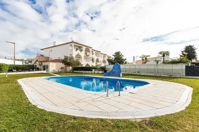 a swimming pool in the yard of a house at Edif. Valemangude in Albufeira
