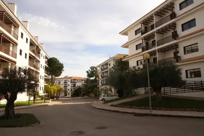 an empty street in an apartment complex at O Pinheiro - Apartment Hannah in Olhos de Água