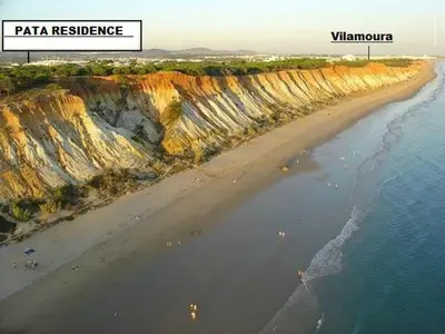 an aerial view of a beach and the ocean at Albufeira 1 bedroom apartment 5 min from Falesia beach and close to center J in Albufeira