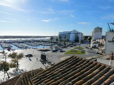 a view of a city from the roof of a building at Happen!ng in Faro