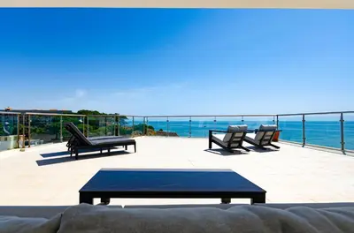 a living room with a view of the ocean at Penthouse Apartment, Superb sea view 1 Bedroom, Verandas do Mar AT02 in Albufeira
