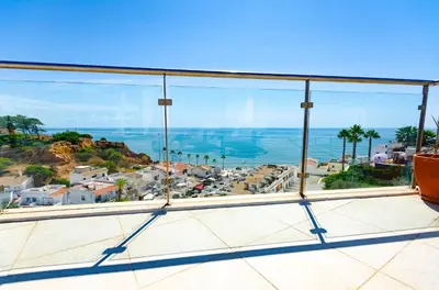 a view of the ocean from a balcony at Penthouse Apartment, Superb sea view 1 Bedroom, Verandas do Mar AT02 in Albufeira