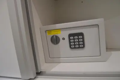 a microwave oven with a control panel on it at Cosy House in Albufeira