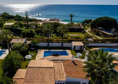 an aerial view of a house and the ocean at Villa Atlas by Algarve Vacation in Albufeira