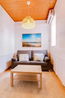 a living room with a couch and a coffee table at TREM - LOCATED IN OLD CITY - FARO in Faro