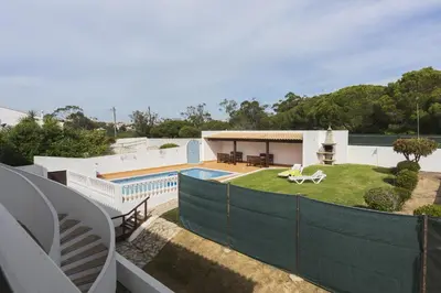 a view of a house with a swimming pool at Vila de Santa Eulália - Albufeira in Albufeira