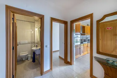 a bathroom with a toilet and a sink at AL - Maré in Albufeira