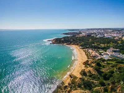 an aerial view of the ocean and a beach at Apartament Portes Balaia Golf Resort in Albufeira